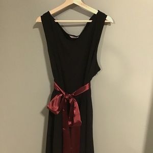 Black dress with burgundy satin sash. NWOT